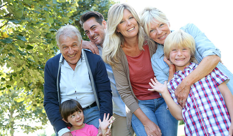 Inter-generational family in group shot, life insurance